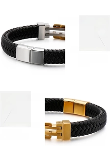 Macro detail of men's braided leather bracelet with magnetic steel clasps in gold and silver