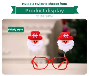Detail of red Christmas glasses with cute Santa Claus plush spring toppers for holiday parties