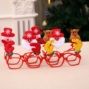 Detail of Christmas glasses frames featuring Santa, snowman and reindeer for party decor