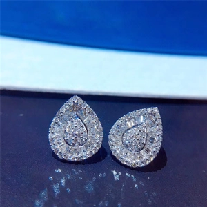Sparkling pink zircon teardrop earrings with white gold plated halo cluster design