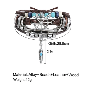 Detailed specs of multi-layer leather bracelet with turquoise, rudder and feather charms