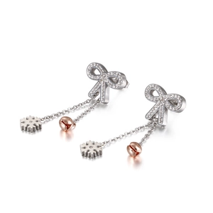 Bow-knot titanium earrings with silver snowflake and rose gold bell pendants