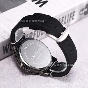 Vintage skull design men's quartz watch with engraved steel case and rubber strap