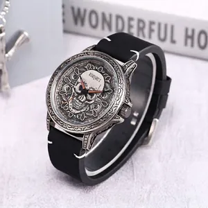 Retro men's quartz watch with skull relief dial, black leather strap and date window