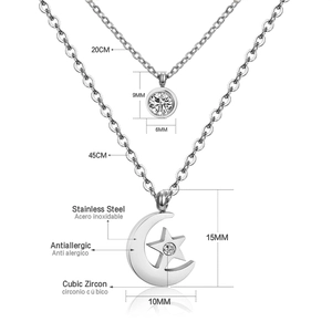 Detailed view of dual stainless steel necklaces with cubic zirconia star and moon pendants