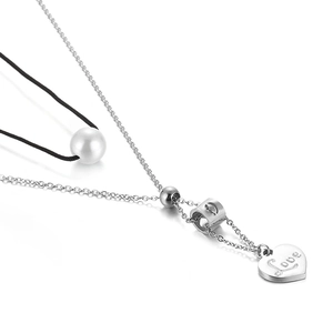 Double-layered stainless steel necklace with pearl and heart Love pendant on white background