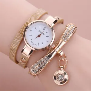 Women's rose gold wrap bracelet watch with rhinestone dragonfly accents and mesh band