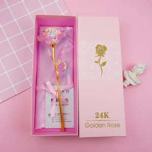 Detailed view of 24K golden rose in pink gift box with certificate and satin ribbon