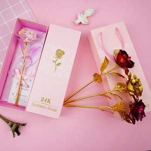 Macro detail of the 24K golden rose kit including certificate and gift packaging