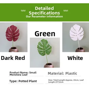 Close-up of artificial monstera leaves showing detailed veins and 65cm length specifications