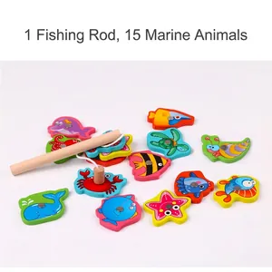 Kids magnetic wooden fishing toy set with colorful marine animals and rod on white background