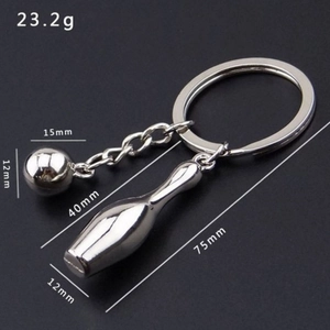 Detailed view of silver bowling ball and pin keychain showing exact dimensions and weight