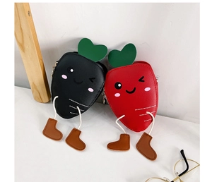 Detail of cute carrot mini crossbody bags with decorative legs and small leather shoes