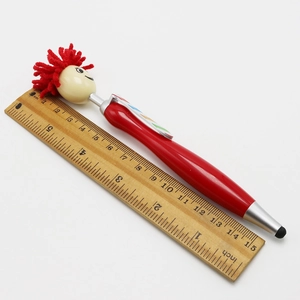 Red cartoon doll ballpoint pen with stylus tip and ruler showing 15cm length
