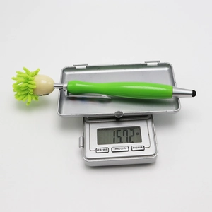 Microfiber mop top stylus pen in green being weighed on a digital scale showing 15.72g