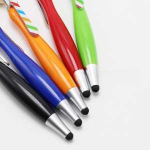 Detail of multi-color pens with rubber stylus tips for touchscreens and metal clips