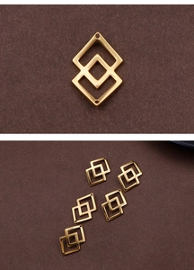 Detailed view of five golden geometric diamond-shaped titanium steel bracelet connectors
