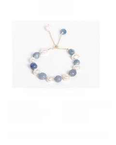Detailed shot of blue aventurine crystals and freshwater pearls on an adjustable gold chain