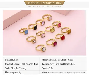 Detail view of colorful glass zircons set in gold plated stainless steel rings