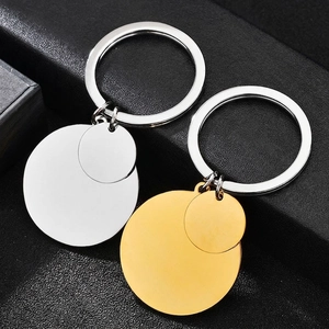 Polished stainless steel round pendant keychains in gold and silver finish for couples