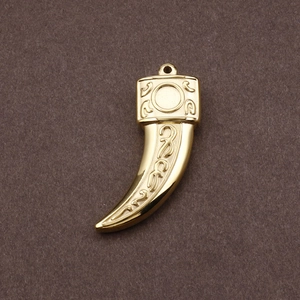 Gothic gold stainless steel wolf tooth pendant necklace with embossed texture detail