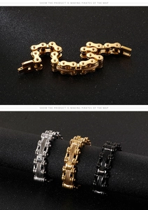 Detail view of industrial motorcycle chain bracelets in gold, silver and black finishes