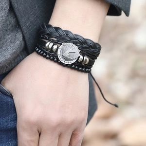Men's multilayer black woven leather bracelet featuring a metal poker card pendant charm