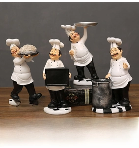 Set of four European resin chef figurines holding trays and pizza for kitchen decor