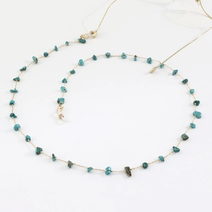 Golden eyewear chain with irregular turquoise stones and silicone anti-slip loops
