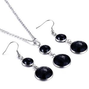 Elegant silver titanium steel jewelry set with round faceted black crystal stones