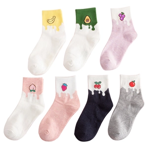 Set of seven colorful cotton crew socks featuring cute fruit embroidery on a white background