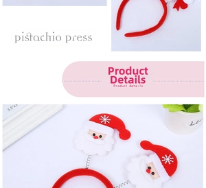 Detail of red Christmas headband with Santa Claus dolls on flexible metal springs