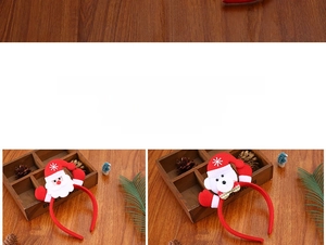 Detailansicht von Weihnachtsstirnbändern mit Weihnachtsmann und Bär sowie Pailletten