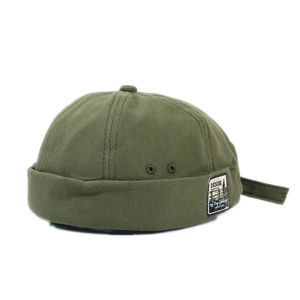 Army green vintage docker cap with embroidered denim label and adjustable strap