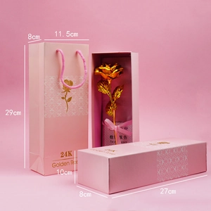 Detailed view of a 24K gold foil rose with pink gift box and matching carrier bag