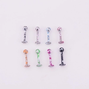 Set of 8 stainless steel lip rings and ear studs with colorful splash paint patterns