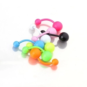 Set of colorful neon stainless steel belly rings with vibrant acrylic beads on white background