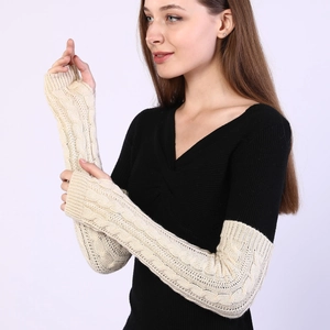 Knitted cable knit long fingerless gloves in cream white for winter arm warmth