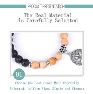 Detail of tree of life charm bracelet with black lava stone and wooden beads