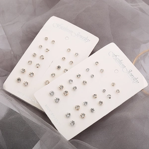 12-pair set of minimalist gold and silver stud earrings with sparkling cubic zirconia