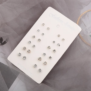 Detail of 12-pair stud earring set with claw-set rhinestones in gold and silver finish