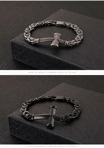 Detail of Viking style Byzantine chain bracelet featuring a metal cross pendant