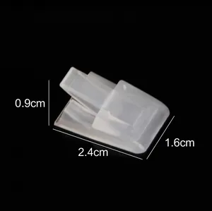Transparenter Ringgrößen-Einsteller aus Kunststoff Maße 2.4cm x 1.6cm auf schwarzem Grund