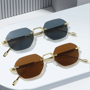 Retro octagonal rimless sunglasses with gold metal frames and tinted lenses for women