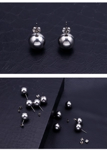 Detailed view of assorted sizes of polished stainless steel ball stud earrings in silver