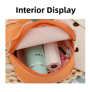 Top view of the interior compartment of a mini carrot bag showing daily essentials