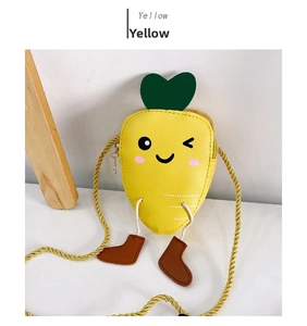 Detail of yellow carrot-shaped kids purse with embroidered face and rope strap