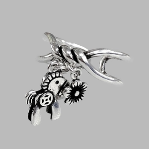 Detailed close-up of silver twist band ring featuring lucky horse and flower charms