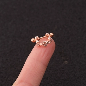 U-shaped rose gold stainless steel cartilage piercing ring with intricate crown pattern
