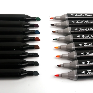 Detailed macro view showing the dual-tip design with fine and chisel nibs of art markers